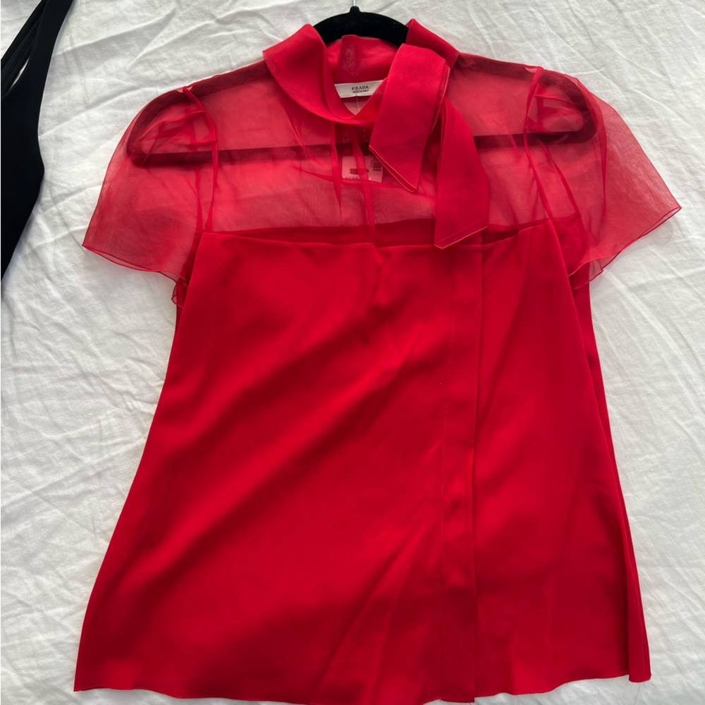 NWT red Prada asymmetrical button up top with sheer sleeves and bow